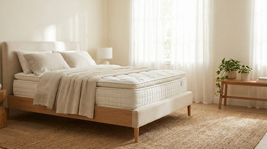 A plush mattress in a beautifully styled bedroom